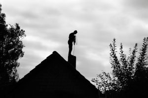 man-shadow-chimney-clean