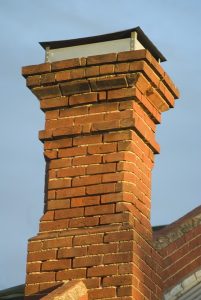 chimney-masonry-worn-brick