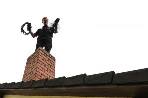 chimney-sweep-cleaning-chimney