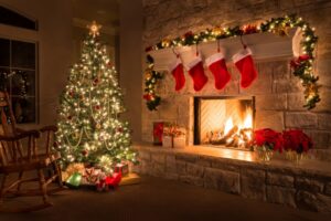 christmas-tree-by-fireplace-with-stockings-on-mantel